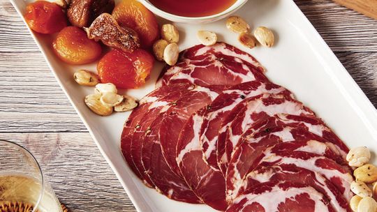 laced with pockets of cured fat that balance out the meat