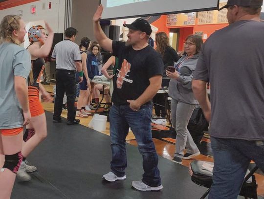 Holbrook steps down as wrestling coach