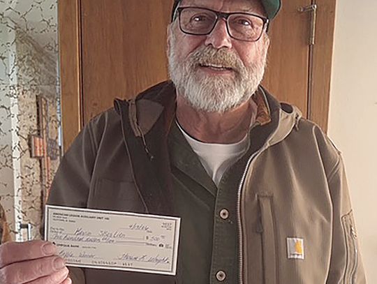 Raffle winner gives back