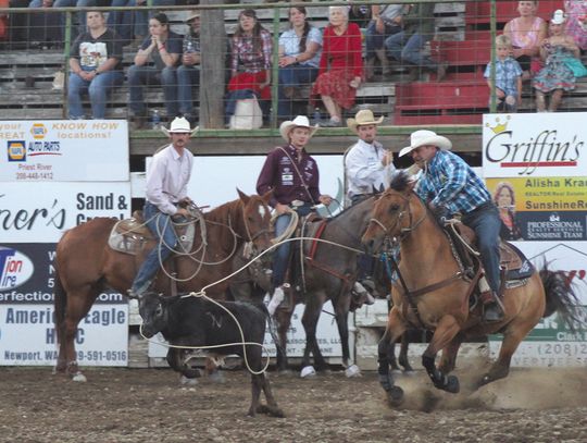 The tie down roping was quick. Here a roper gets his calf caught quickly