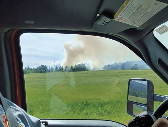 South Pend Oreille, DNR go after grass fire