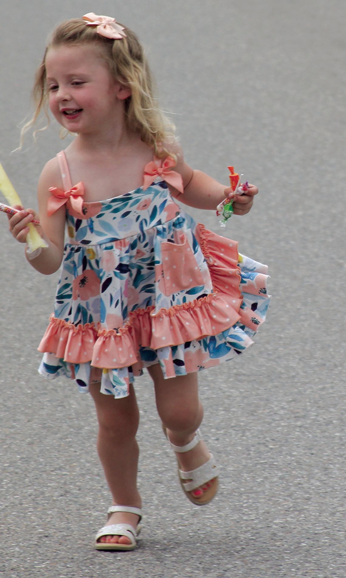 Candy and an Otter Pop during the parade Saturday