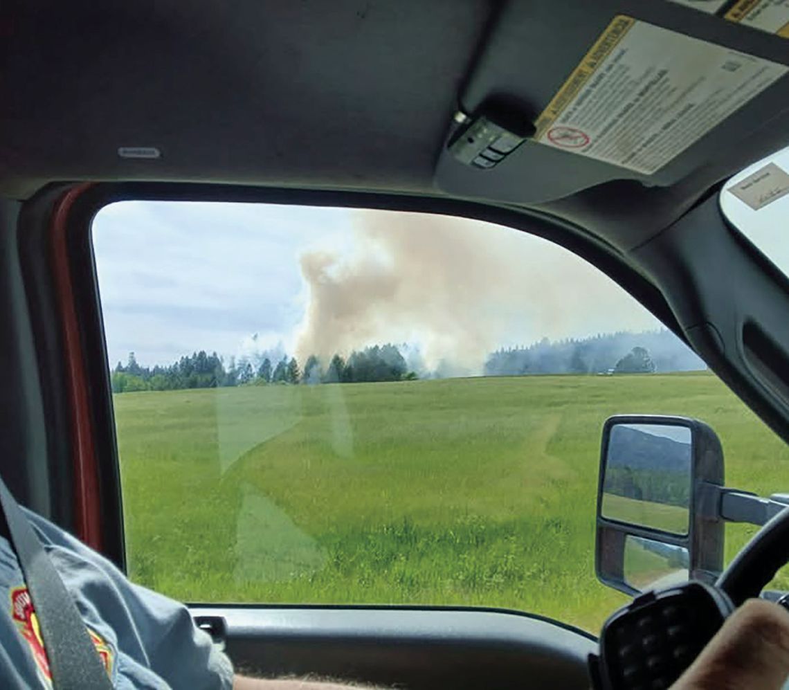 South Pend Oreille, DNR go after grass fire